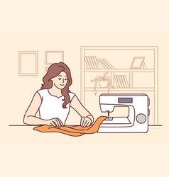 Happy Woman Sewing On Machine At Home