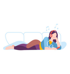 Woman Lying On Couch And Listening Music Home