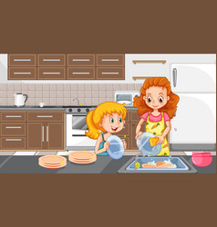 Mother And Daughter Washing Dishes In Kitchen