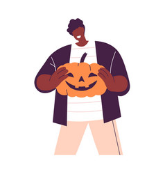 Happy Black Man Holding Halloween Pumpkin