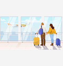 A Couple With Luggage Standing In An Airport