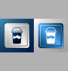 White Coffee Cup To Go Icon Isolated On Blue