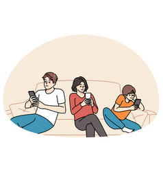 Parents With Child Sit On Sofa Using Cellphones