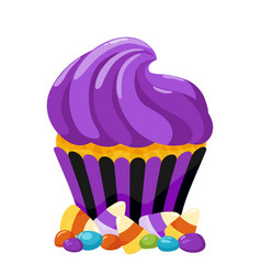 A Purple Cupcake With Candy And Corn