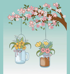 Mason Jars With Flower Hanging In Tree Branch