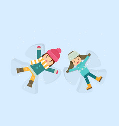 Girl And Boy Making A Snow Angel