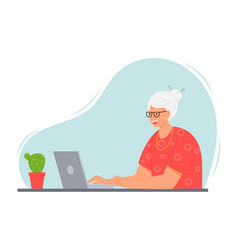 A Happy Elderly Woman With Gray Hair Is Sitting