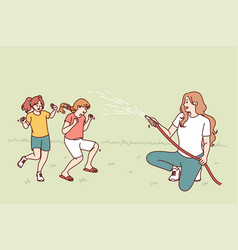 Happy Mother Watering Laughing Children With Hose