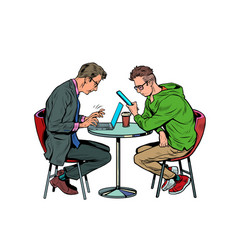 Two Men In A Cafe Are Working On A Laptop