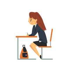 Bored Female Student Sitting At Desk In Classroom