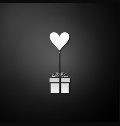 Silver Gift With Balloon In Shape Heart Icon