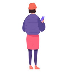 Young Woman In Winter Clothes Hold Smartphone Rear