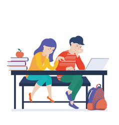 Boy And Girl Doing Homework On Computer Together