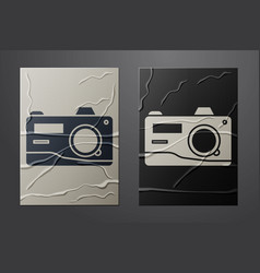 White Photo Camera Icon Isolated On Crumpled Paper