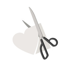 Cut Out A Heart From Paper With Scissors