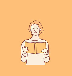 Portrait Of Young Smiling Woman Reading Book