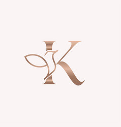 Golden Bird Logo Beauty Letter K