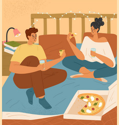 Happy Couple Eating Pizza On Bed At Home