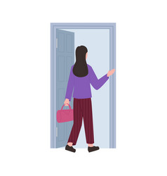 Young Woman With Bag Walking Out Gray Door To