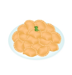 A Dish Of Mini Thai Curry Puffs