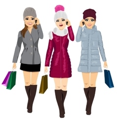 Three Young Fashion Women With Shopping Bags