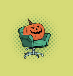 Halloween Pumpkin Is Sitting In A Chair