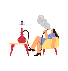 Relaxed Woman Sitting In Armchair And Smoking