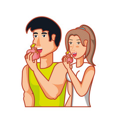 Young Athletic Couple Eating Apple