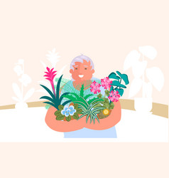 Elderly Lady Holds Home Flowers