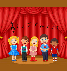 Children Performing Singing On Stage