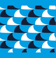 Seamless Pattern Of Shark Fins On A Blue