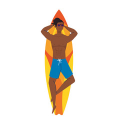 Man Afro In Shorts Lying Down On Surfboard