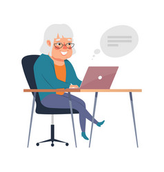 Cute Old Woman Working On Laptop Communicating