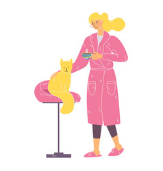 Young Woman In Pink Home Bathrobe With Cat