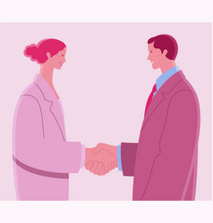 Two Young Business People Shaking Hands