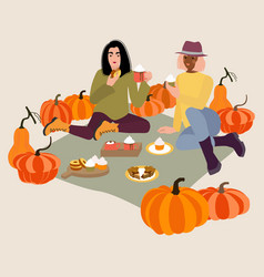 Young Women On Pumpkin Patch Picnic In Autumn