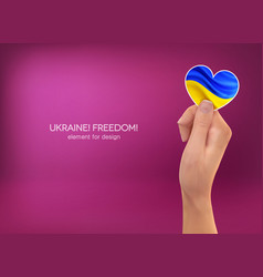 Right Hand Holds A Cut Out Heart Ukrainian Flag