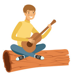 Guy Sit On Wooden Log And Play Guitar Outdoor