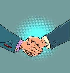 Handshake Of Male Hands At A Business Meeting