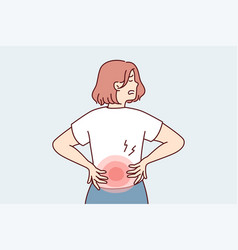 Woman Holds On To Red Lower Back After Failing