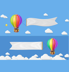 Hot Air Balloons With Blank Banner In Blue Sky