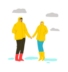 Couple In Raincoats And Rubber Boots Standing