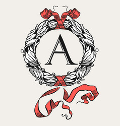 Laurel Wreath With Red Ribbon And Initial Inside