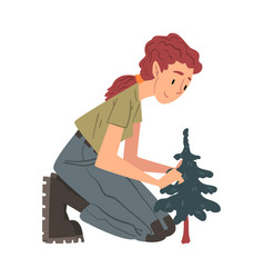 Girl Forest Ranger Caring For Fir Tree