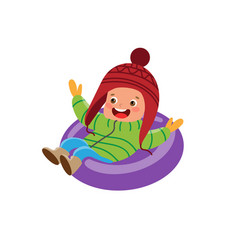 Cheerful Teen Boy On Tube Sled Fun