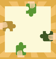 Hands Holding A Jigsaw Puzzle Pieces To Each