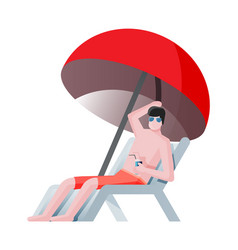 Male Sitting In Sunbed Under Umbrella