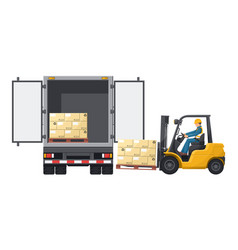 Forklift Loading Pallet Of Stacked Boxes