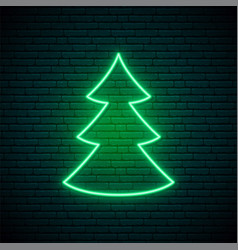 Neon Green Christmas Tree Shape On Brick Wall