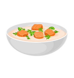 Creamy Soup With Salmon And Pepper Poured In Bowl